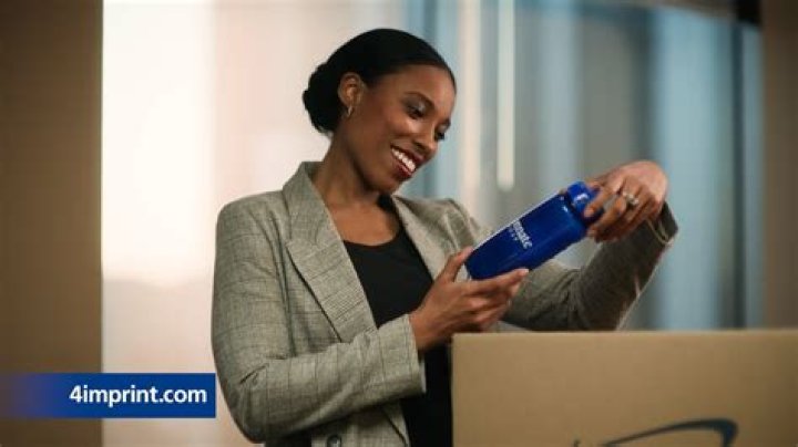 4imprint commercial actress "I'm on it" in a Pink dress with short hair
